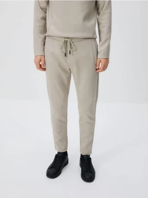 Reserved - Spodnie dresowe slim - jasnoszary