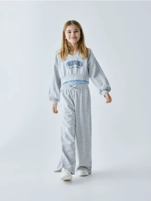 Reserved - Spodnie dresowe SmileyWorld® - jasnoszary