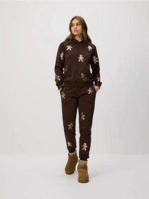Reserved - Spodnie dresowe z aplikacjami - ciemnobrązowy