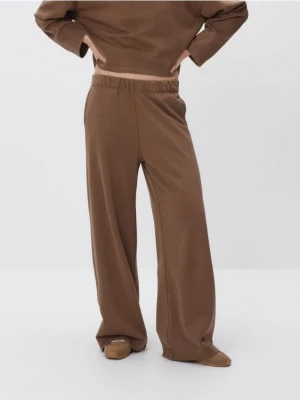 Reserved - Spodnie dresowe z bawełną - brązowy