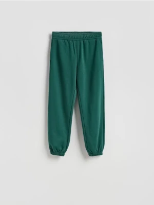 Reserved - Spodnie dresowe z bawełną - ciemnozielony