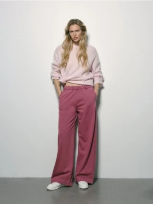 Reserved - Spodnie dresowe z bawełną - jasnofioletowy