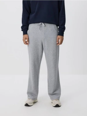 Reserved - Spodnie dresowe z bawełną - jasnoszary
