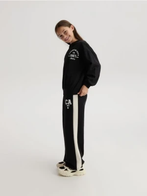 Reserved - Spodnie dresowe z lampasami - czarny