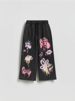 Reserved - Spodnie dresowe z nadrukiem - czarny