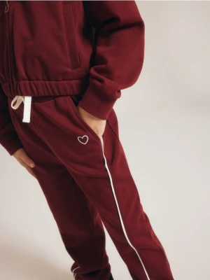 Reserved - Spodnie dresowe z przeszyciami - bordowy