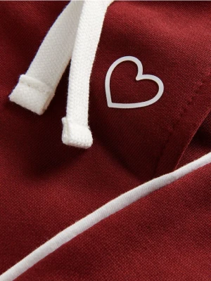 Reserved - Spodnie dresowe z przeszyciami - bordowy