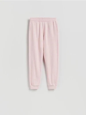 Reserved - Spodnie dresowe ze ściągaczem - pastelowy róż