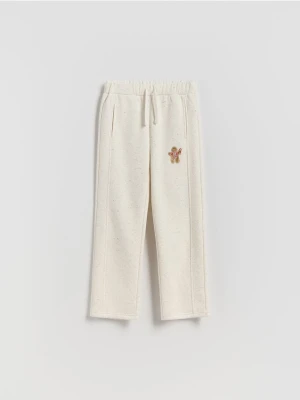 Reserved - Spodnie dresowe ze świątecznym haftem - złamana biel