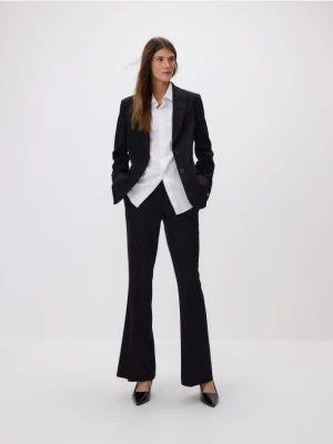 Reserved - Spodnie flare w paski - czarny