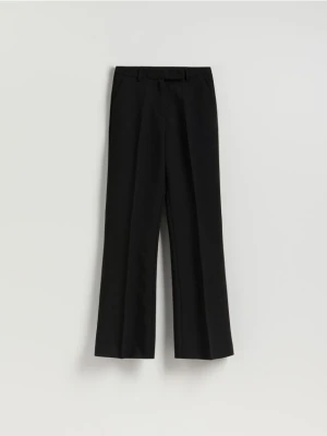 Reserved - Spodnie flare z kantem - czarny