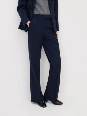 Reserved - Spodnie flare z kantem - granatowy