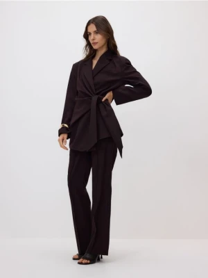 Reserved - Spodnie flare z kantem - mahoniowy