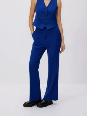 Reserved - Spodnie flare z kantem - niebieski