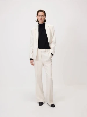 Reserved - Spodnie flare z kantem - złamana biel