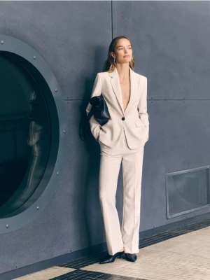 Reserved - Spodnie flare z kantem - złamana biel