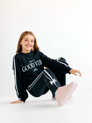 Reserved - Spodnie flare z lampasem - czarny