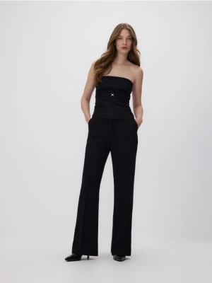 Reserved - Spodnie flare z metaliczną nitką - czarny