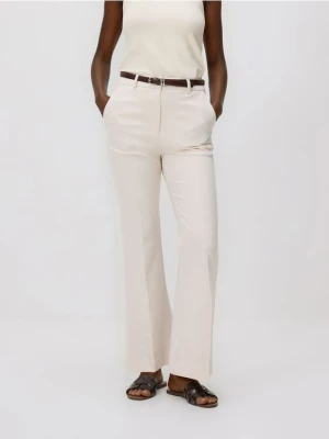 Reserved - Spodnie flare z paskiem - złamana biel