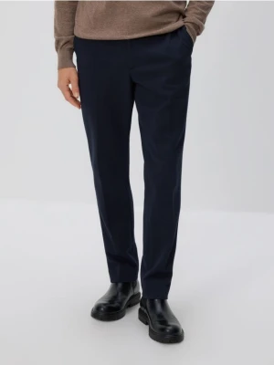 Reserved - Spodnie garniturowe slim fit - granatowy