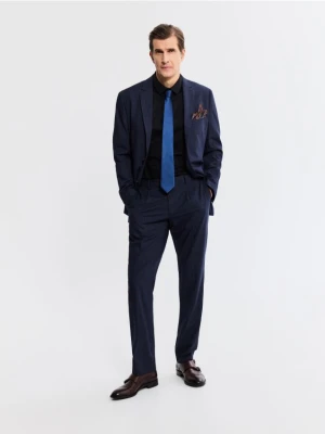 Reserved - Spodnie garniturowe slim fit - granatowy