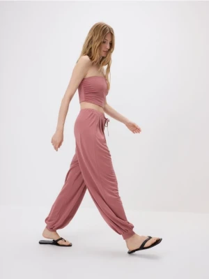 Reserved - Spodnie jogger z modalem - jasnofioletowy