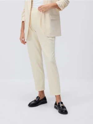 Reserved - Spodnie jogger z zakładkami - jasnożółty