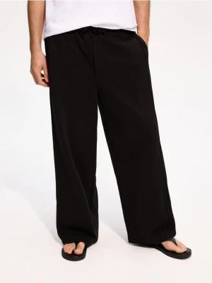 Reserved - Spodnie loose fit - czarny