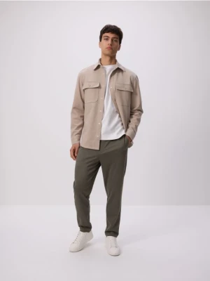 Reserved - Spodnie regular fit - jasny zielony