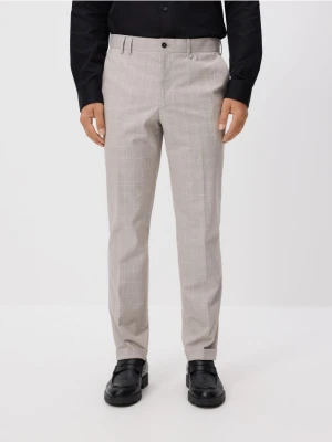 Reserved - Spodnie slim fit w kratę - beżowy