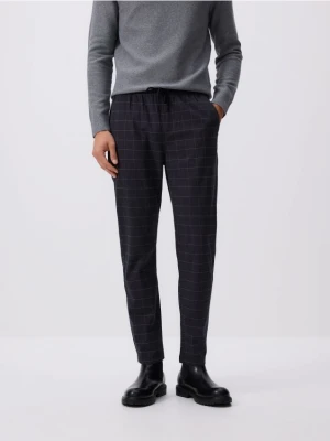 Reserved - Spodnie slim fit w kratę - granatowy