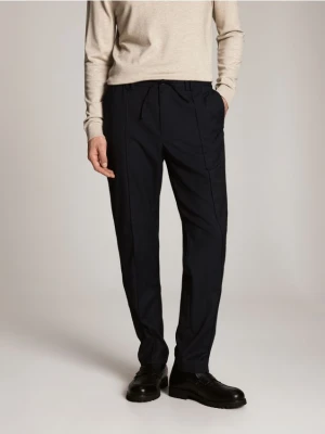 Reserved - Spodnie slim fit z dodatkiem wełny - granatowy