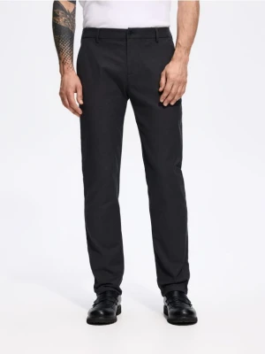 Reserved - Spodnie slim fit z mikrowzorem - czarny