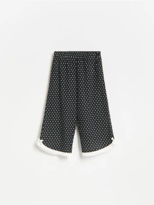 Reserved - Spodnie wide leg w kropki - czarny