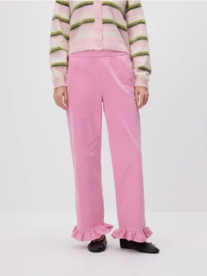 Zdjęcie produktu Reserved - Spodnie z falbanką - pastelowy róż