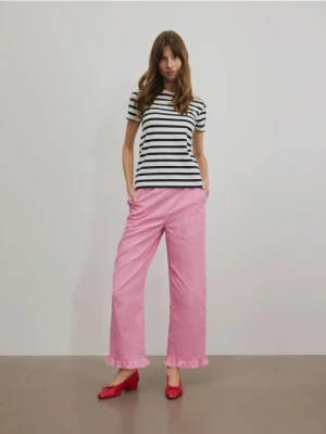 Reserved - Spodnie z falbanką - różowy