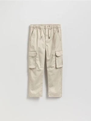 Reserved - Spodnie z kontrastowymi przeszyciami - złamana biel