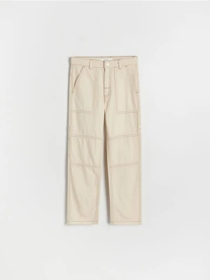 Reserved - Spodnie z kontrastowymi przeszyciami - złamana biel