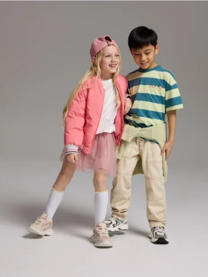 Reserved - Spodnie z kontrastowymi przeszyciami - złamana biel