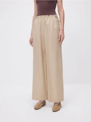 Reserved - Spodnie z lnem - beżowy