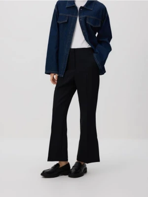 Reserved - Spodnie z rozcięciami petite - czarny