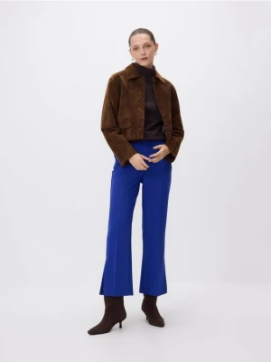 Reserved - Spodnie z rozcięciami petite - niebieski