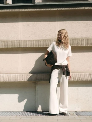 Reserved - Spodnie z szeroką nogawką - beżowy