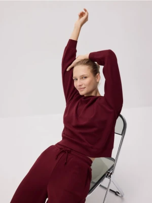 Reserved - Spodnie z szeroką nogawką - bordowy