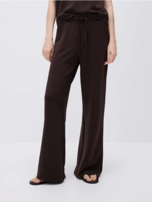 Reserved - Spodnie z szeroką nogawką - ciemnobrązowy