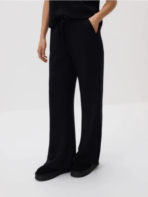 Reserved - Spodnie z szeroką nogawką - czarny
