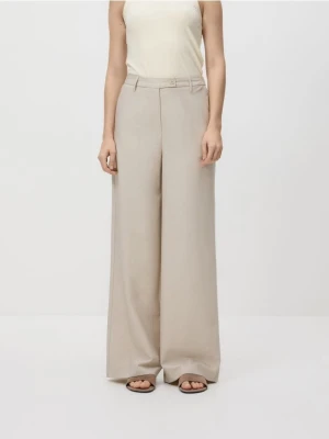 Reserved - Spodnie z szerokimi nogawkami - beżowy