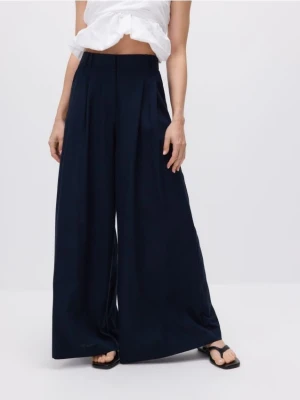 Reserved - Spodnie z szerokimi nogawkami - granatowy