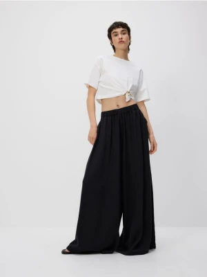 Reserved - Spodnie z szerokimi nogawkami z lyocellu - szary