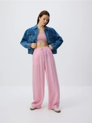 Reserved - Spodnie z tkaniną cupro - pastelowy róż